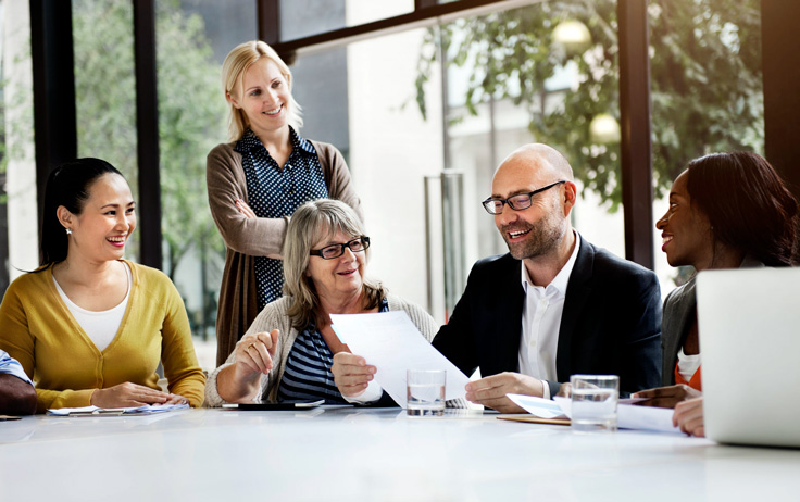 human resources colleagues meeting with insurers